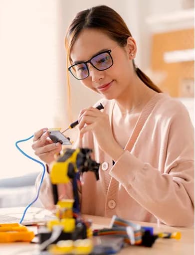 Woman working with electronics